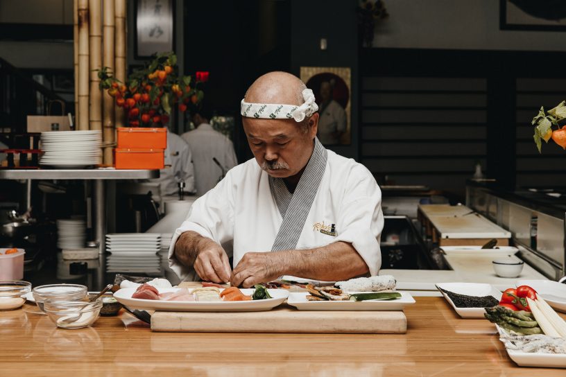 Chef Hidekazu Tojo makes sushi