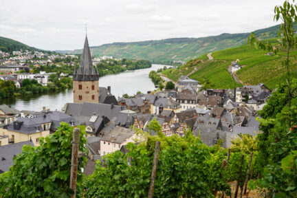 An overhead view of a town on a river.