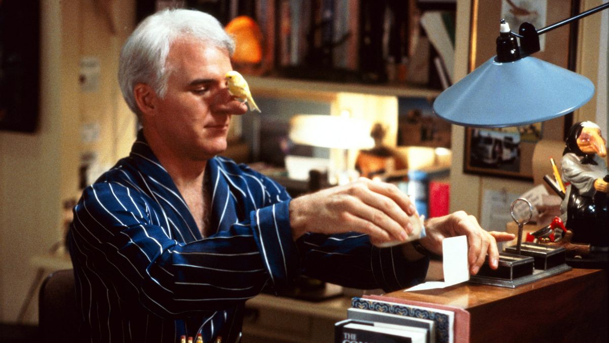 Steve Martin with a yellow bird perched atop his large nose in Roxanne.