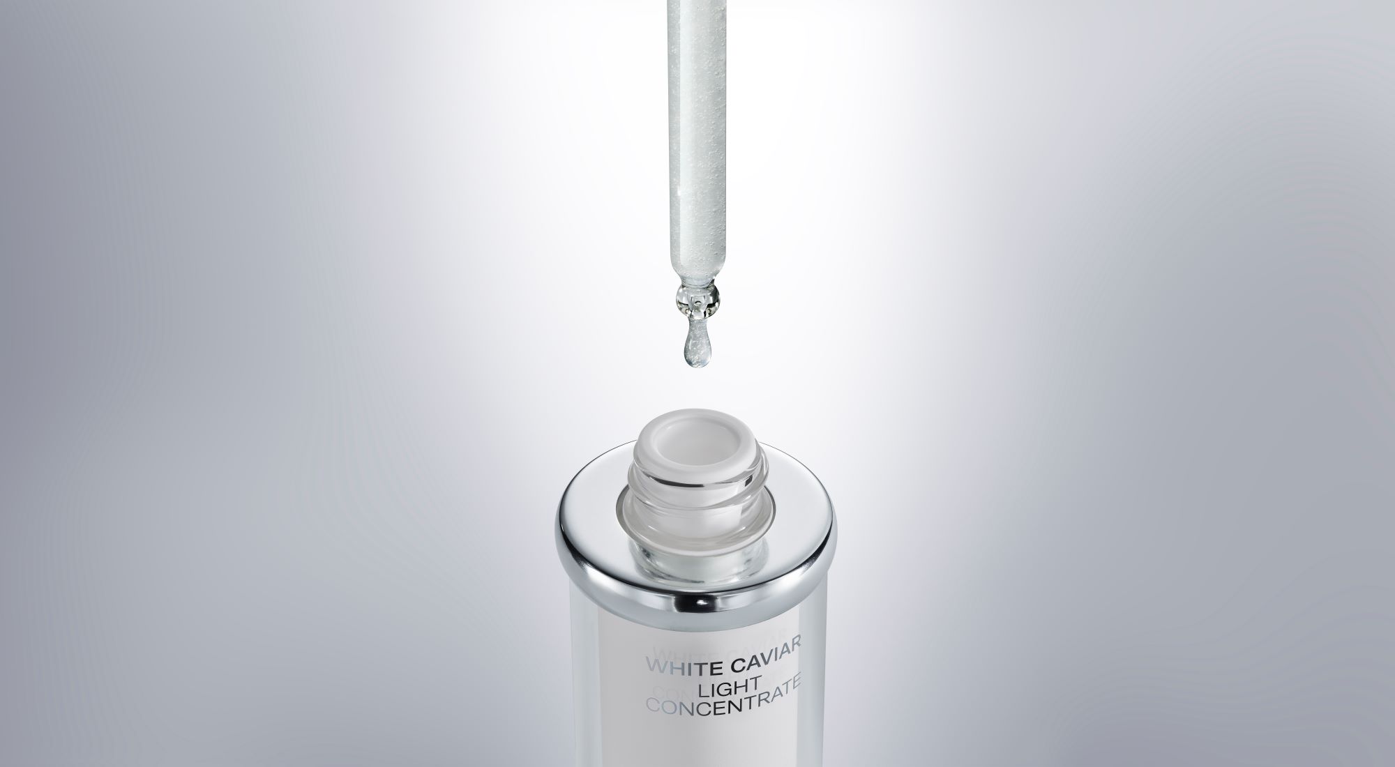 A close-up of a glass dropper.