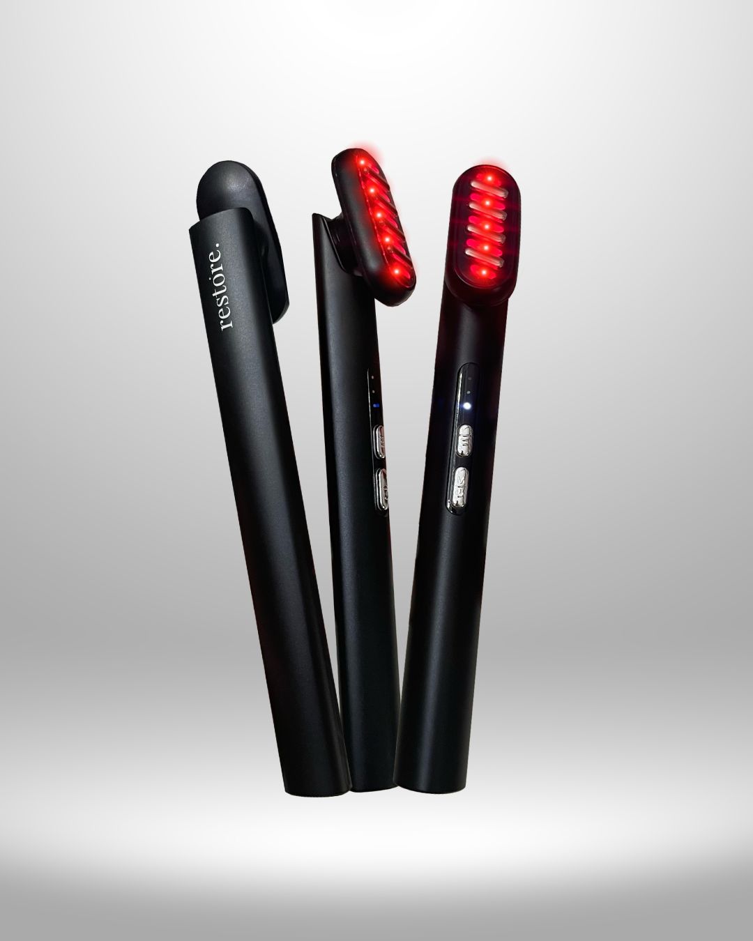 Three red light wands