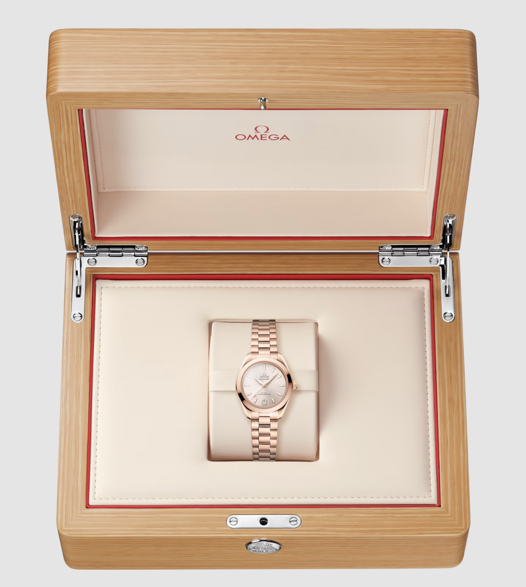 Wishlist: A gold Omega watch inside a wooden display box