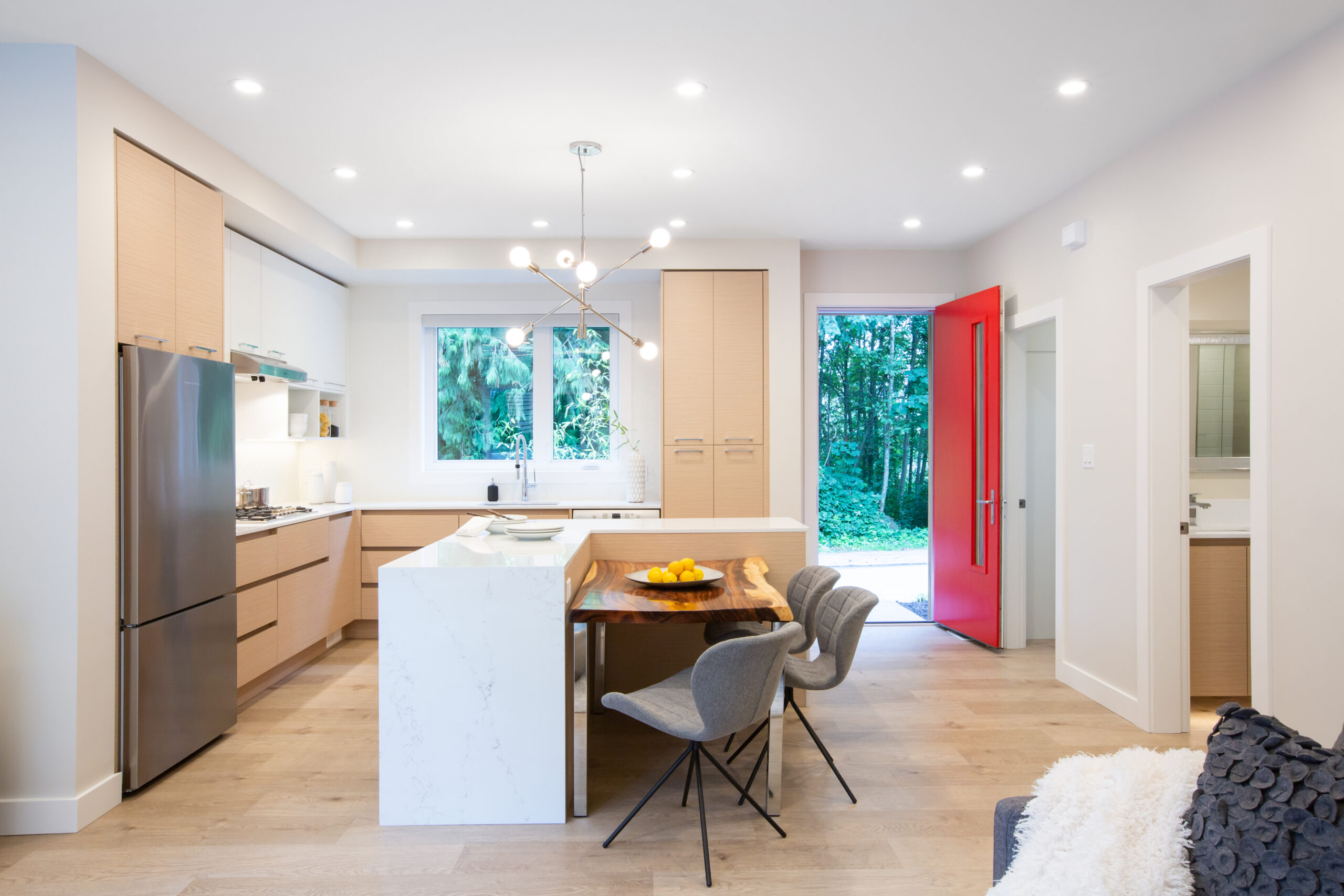 Interior of a Modcube laneway home. A kitchen with kitchen island.