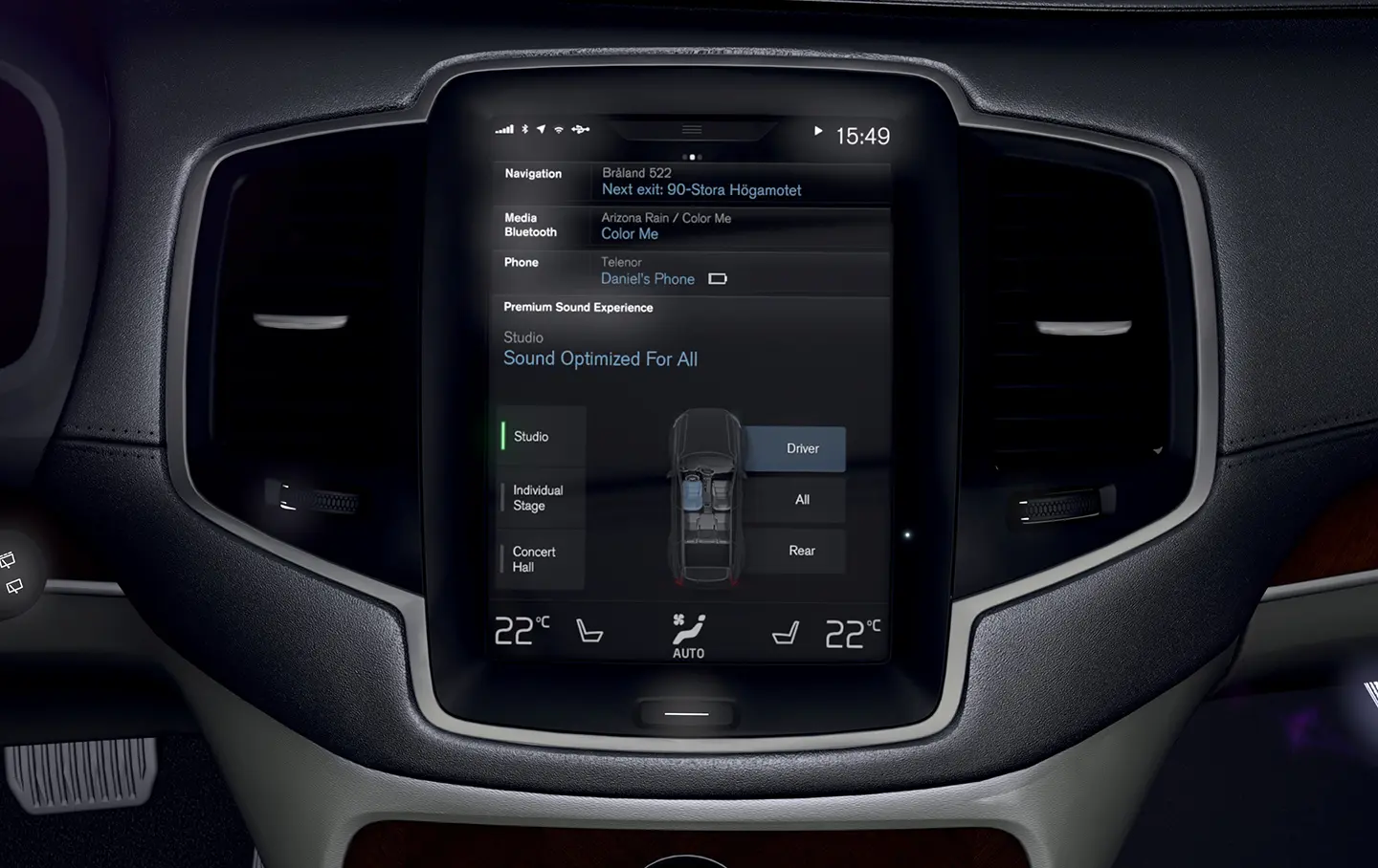 Close-up of a digital audio system screen in a car.