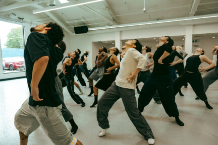 Artists from Ballet BC dance.