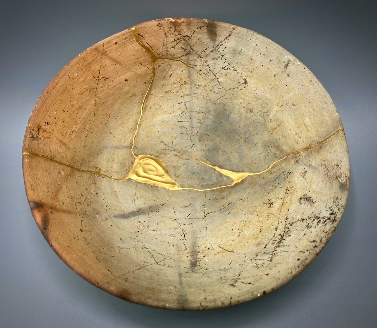 A plate repaired using kintsugi.