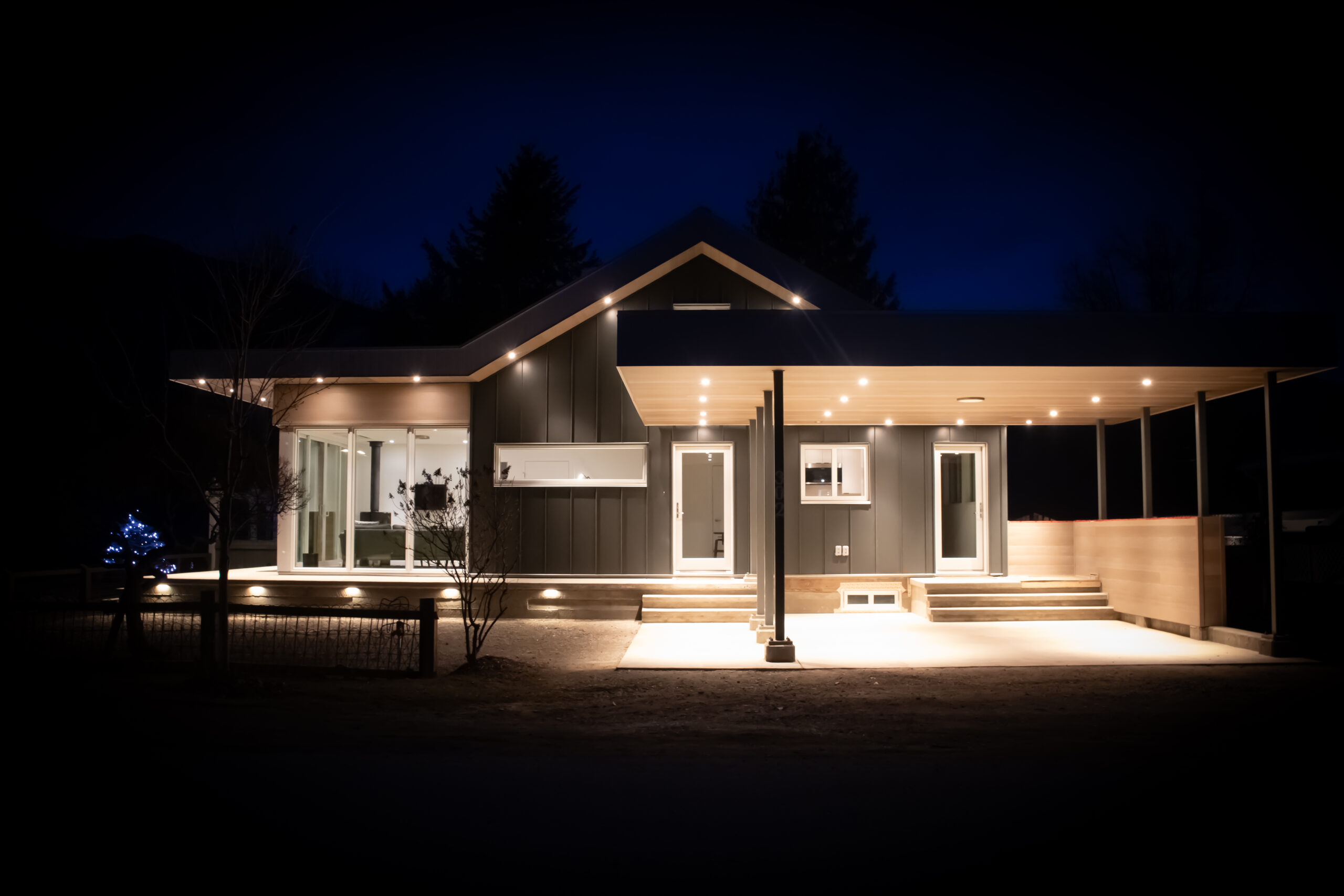 Exterior of the Jones house at night.