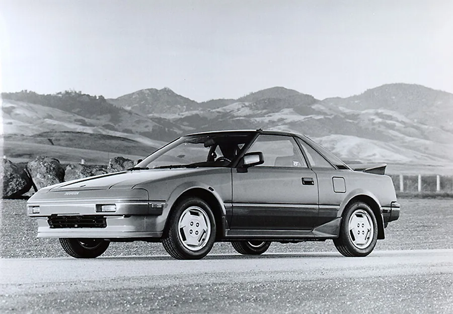 A black and white photo of an early MR2.