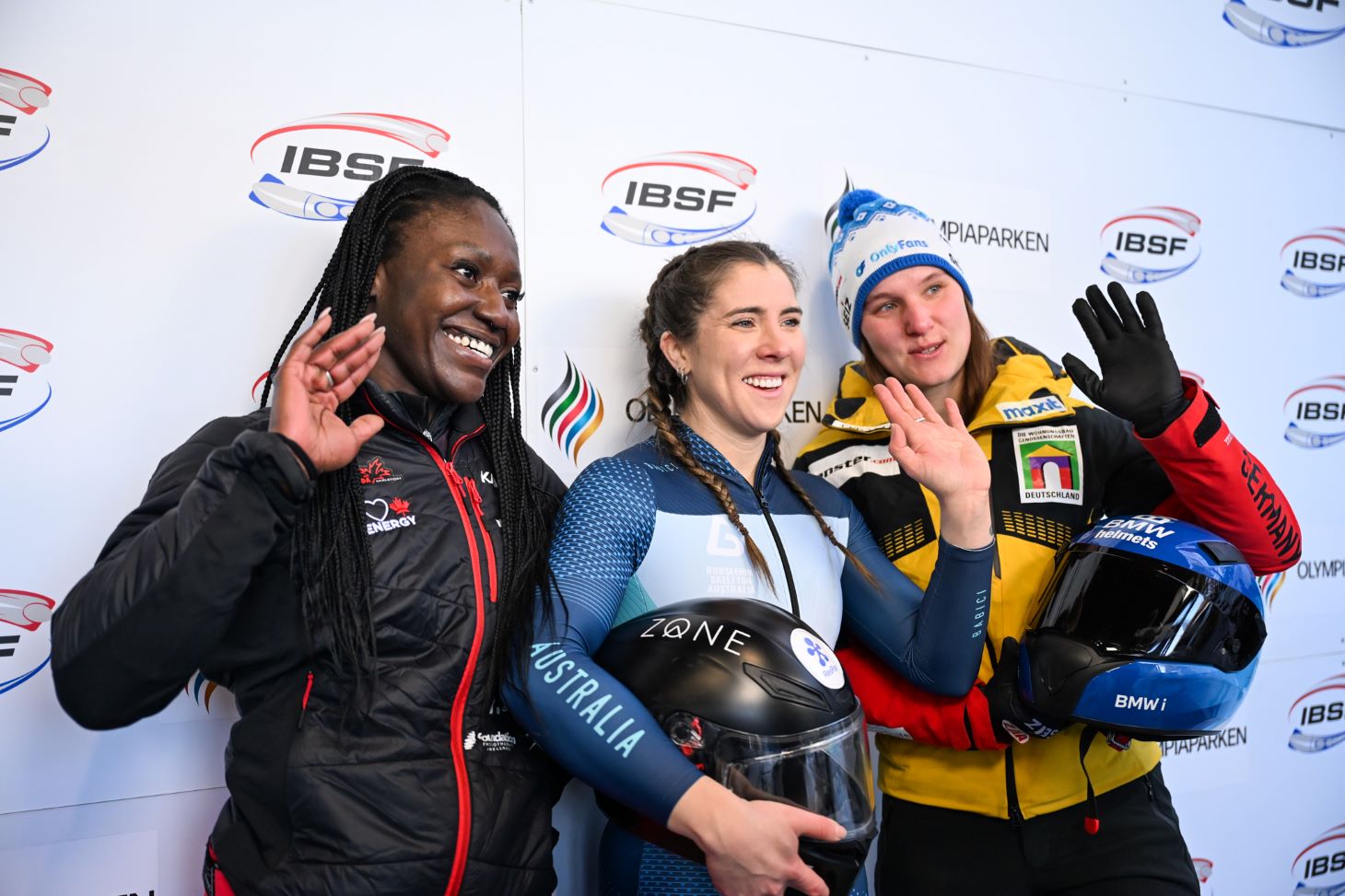 Cynthia Appiah poses with two other athletes.