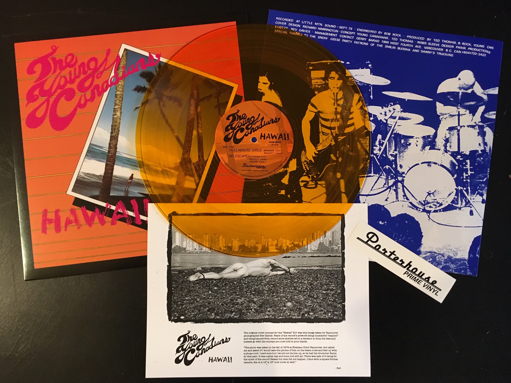 An album jacket and translucent vinyl.