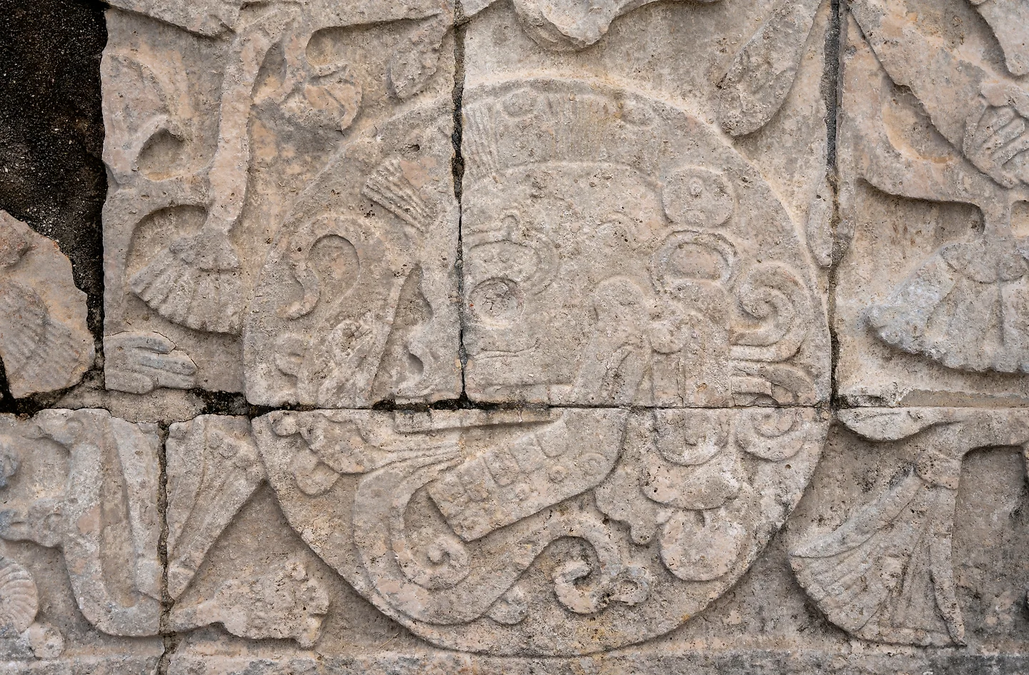 A close up of a basrelief on stone.
