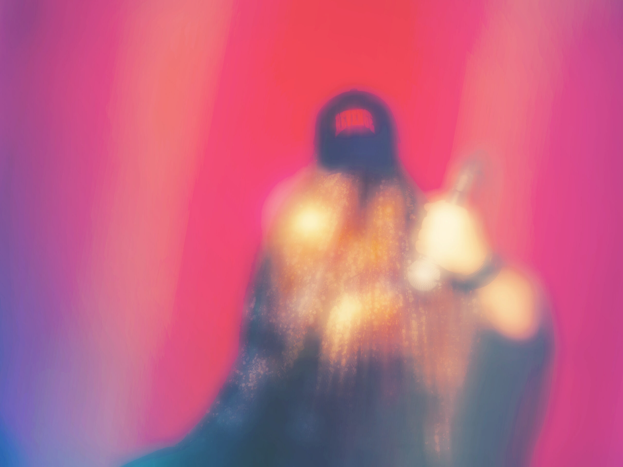 A blurry photo of Golden Age of Wrestling on stage against a red background.